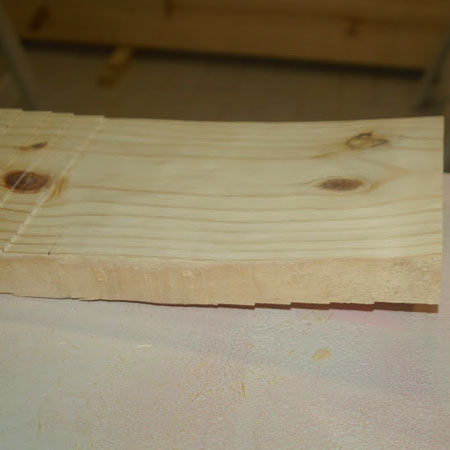 BELOW: Half the curved seat after sanding with a flap disc.