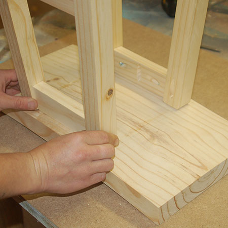 9. To attach the base to the seat, place a bead of wood glue along the top edge of the frame and position centrally underneath the seat.