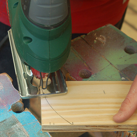 3. Measure and mark 184mm on one side of both dividers - insert back and cut a curve at the top of the [2] dividers.