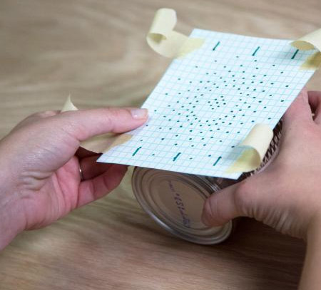 Draw out a design on a piece of graph paper