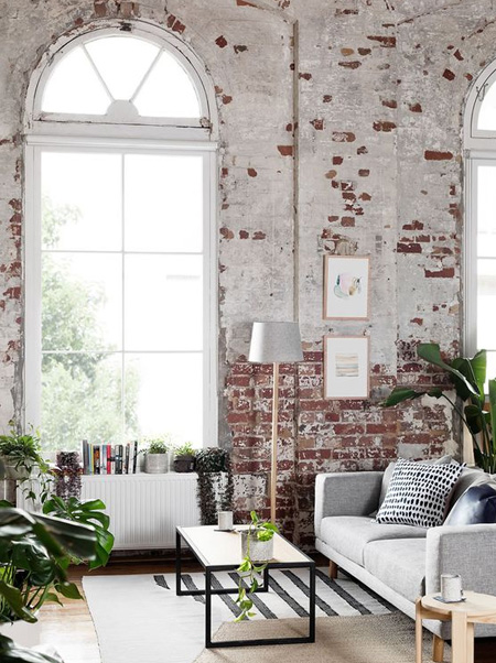 living room with exposed brick