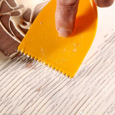 plastic spreader for wood glue
