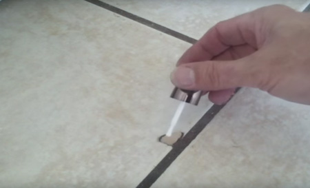 repair chip in floor tile