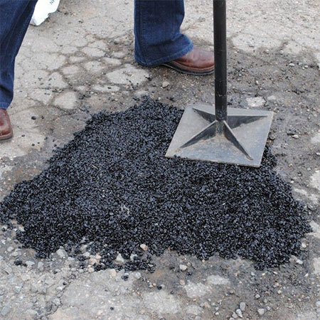 use builders cold asphalt to repair driveway