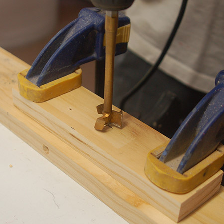 HOME-DZINE | Upholstery Projects - Use a MAD, Forstner or spade bit (same diameter as chrome pipe) to make a hole to half the depth of one of the blocks.