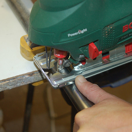 HOME-DZINE | Upholstery Projects - Clamp the pipe to your work bench and use a jigsaw and steel jigsaw blade to cut a length of pipe - 120 to 150mm should be sufficient.&nbsp;