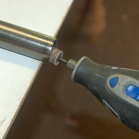 HOME-DZINE | Upholstery Projects - Dremel Multitool and sanding ring to sand both inside and outside the bottom edge of the pipe to make it sharp. 