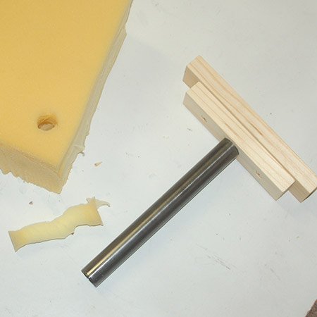 HOME-DZINE | Upholstery Projects - First attempt at cutting a hole in 10cm thick foam. The cutting edge is not sharp enough and needs more grinding with the Dremel Multitool and sanding ring.