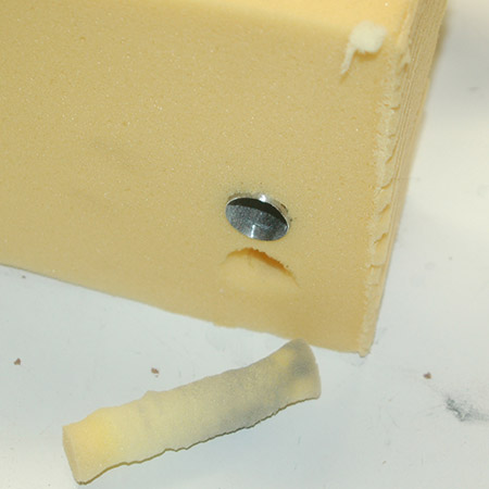 HOME-DZINE | Upholstery Projects - After more sharpening the cutter cuts right through. Simply twist and turn until you reach the bottom of the foarm - remove the foam plug - and them pull out.