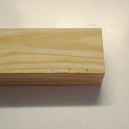 2. At the end of the top mark 3 sections, each 200mm wide. Cut these away with a mitre saw (or jigsaw or table saw).