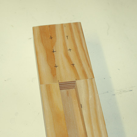 Mark the block where the pens and pencils will go. 