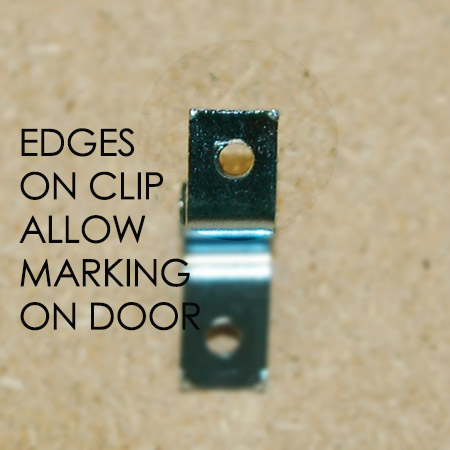 There are small ridges on the corners of the clip that will leave a mark on the door.