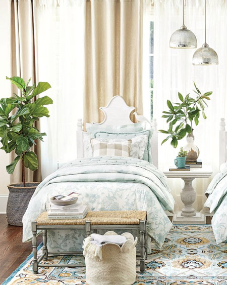 If you don't like the look of blinds, there's always the option of a layered window treatment with sheers and drops of curtains across the window. Place a single drop behind the bed to draw attention to the headboard.