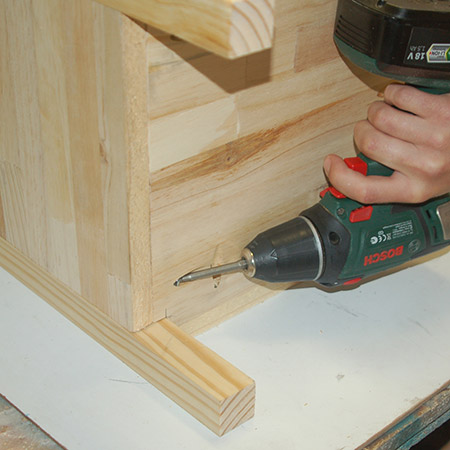 8. Secure the base in place with screws.