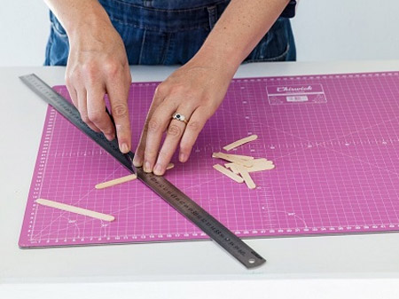 HOME-DZINE | Craft Ideas - Cut all the ice cream sticks in half. Use a sharp craft knife, steel ruler and cutting mat.