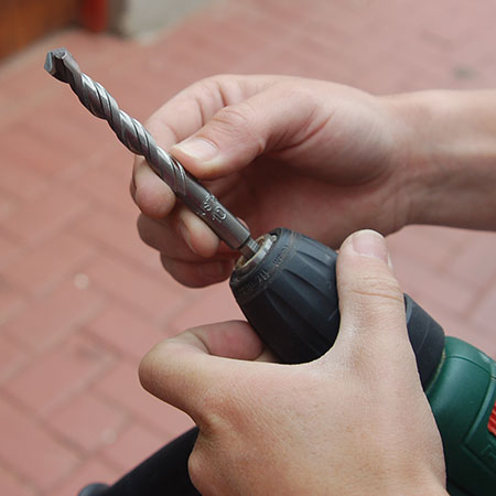 While away on holiday, some of the neighbourhood kids were playing on the garden gate and broke one of the fixing bolts. Half the bolt was still in the wall, and not wanting to move the gate, here's how to replace the bolt without having to move the entire gate.
