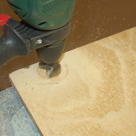 7. Mark and drill out for the concealed hinges. You will find detailed instructions here. On this cabinet we used inset hinges that allow the door to fit inside the frame.