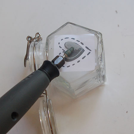 HOME-DZINE | Dremel Projects - Working with smooth strokes from left to right, and turning the glass container as you work, outline the design and then fill in any detail.