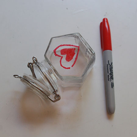 HOME-DZINE | Dremel Projects - To make the design stand out we filled the engraved areas with red permanent marker. Use tissue paper to wipe off before the ink has time to dry.