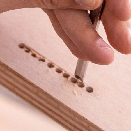 chisel out for mounting pencil container