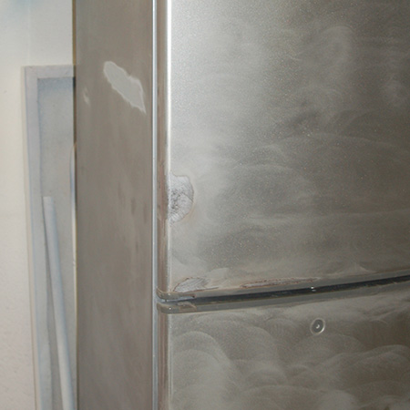 restore refrigerator with Rust-Oleum Appliance Epoxy spray paint - sand the outside