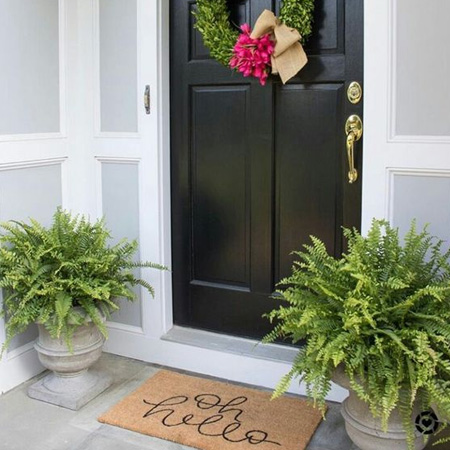 door mat with welcome message