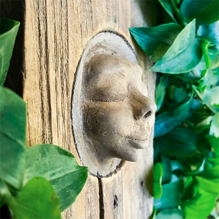 cast concrete wood nymph garden ornament