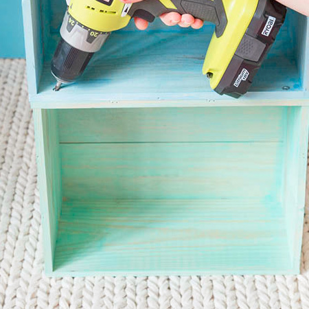 join the wooden crates together