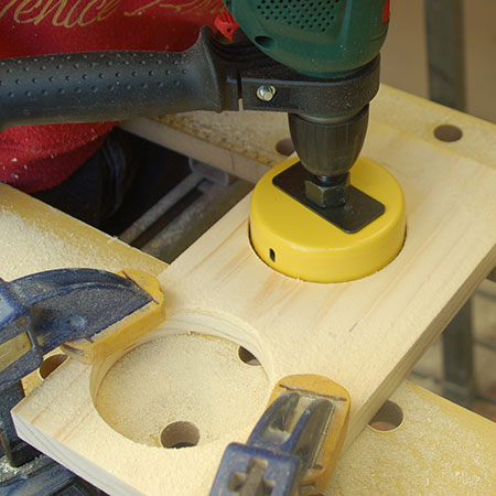 how to drill holes through wood