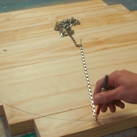 draw a circle with a length of chain and pencil