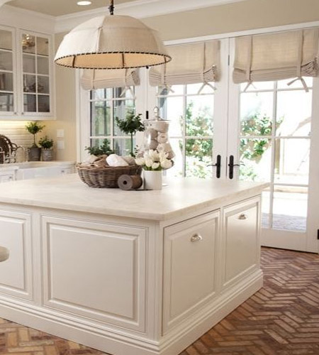 Window treatments for a French door shouldn't be boring or bland. These doors are meant to be a feature in any room and adding a layered window treatment to these doors keeps it simple without compromising on privac