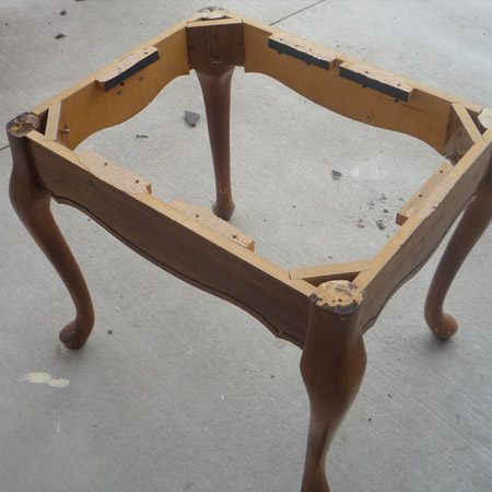 The top of the table was removed and a jigsaw used to cut out the shape around the edge.