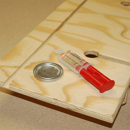 We wanted to add a candle holder to our bath caddy, but rather than use a router to cut a circulate rebate, we sourced a can lid and glued this onto the caddy with epoxy glue. 
