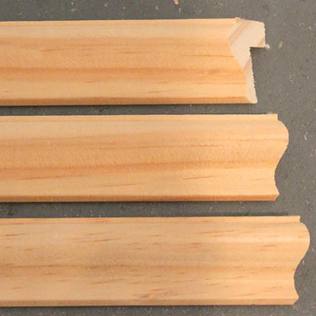 Pine moulding is glued around the lid of the wooden lantern to give it more structure.