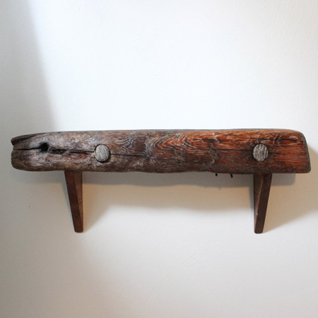 Bathroom goes coastal with driftwood shelf