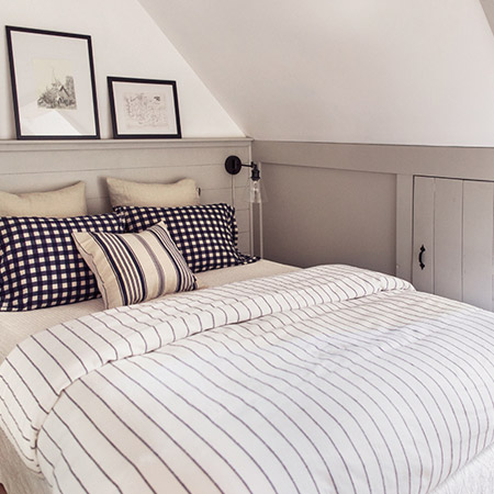 All that was required was paint and love to turn a pokey hole into a comfortable bedroom