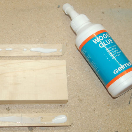 glue moulding to piece of wood