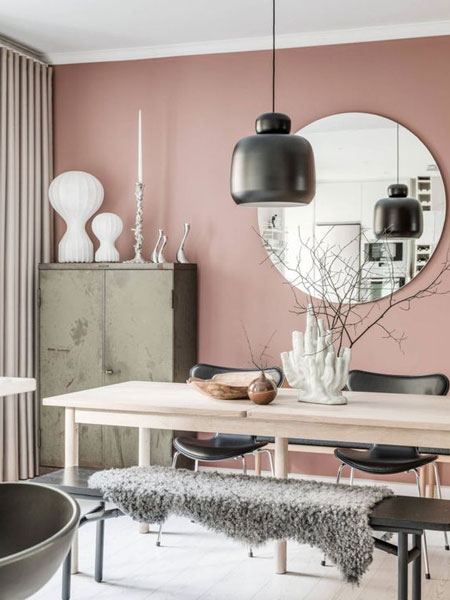 use mirrors to brighten a room