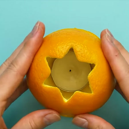 orange skin festive candle