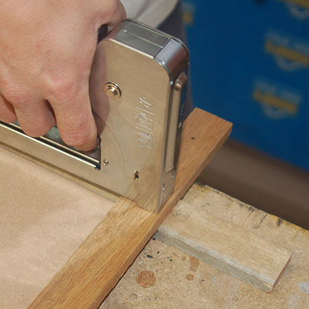 glue and staple the trellis corners