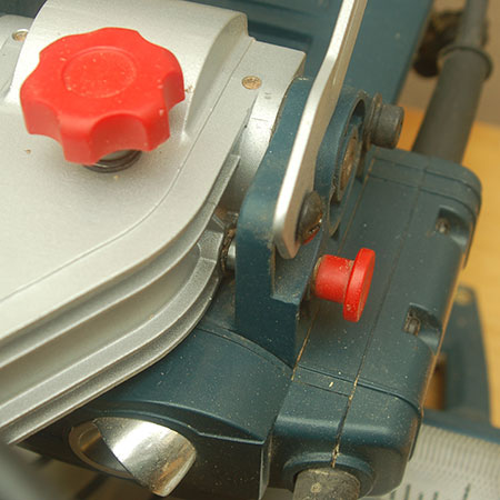 lock pin for holding head of mitre saw fixed in place