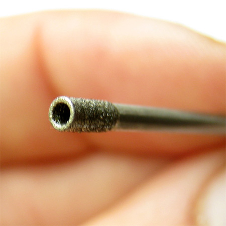 drill holes in pebble or stone