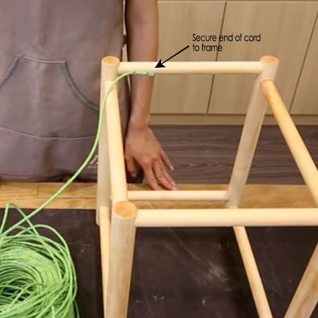 secure cord to stool frame