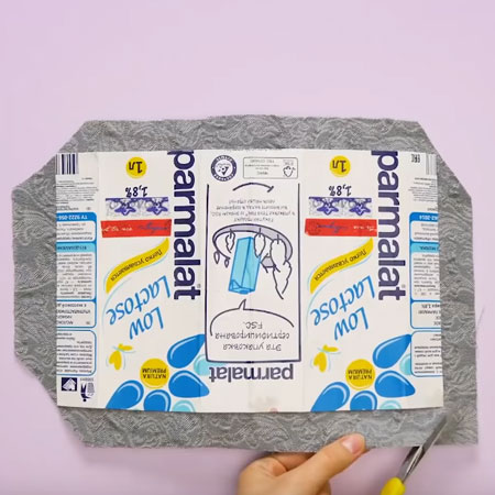 Make a designer clutch from recycled materials