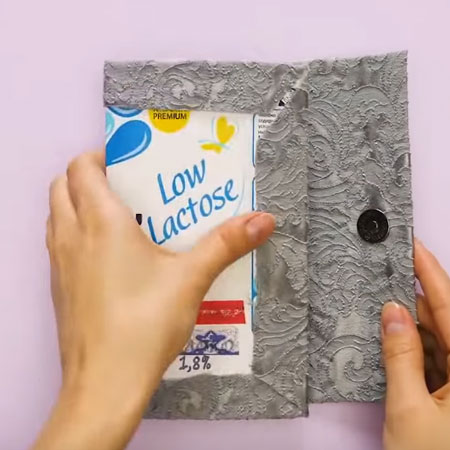 Make a designer clutch from recycled materials