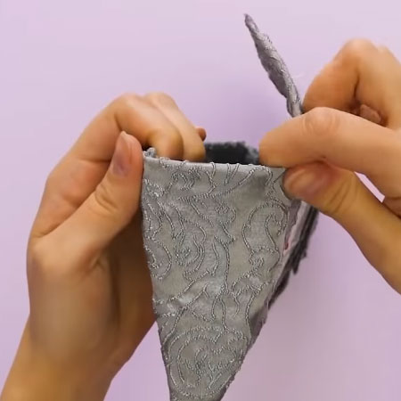 Make a designer clutch from recycled materials