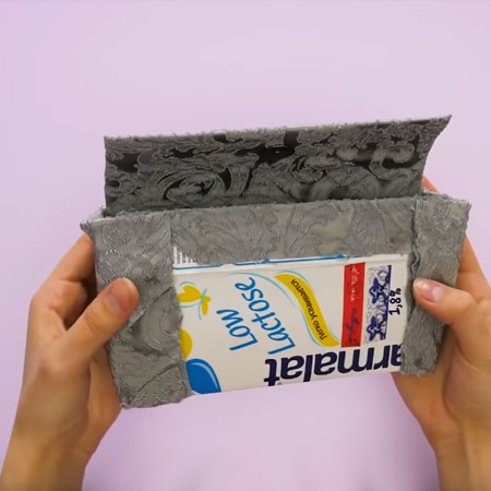 Make a designer clutch from recycled materials