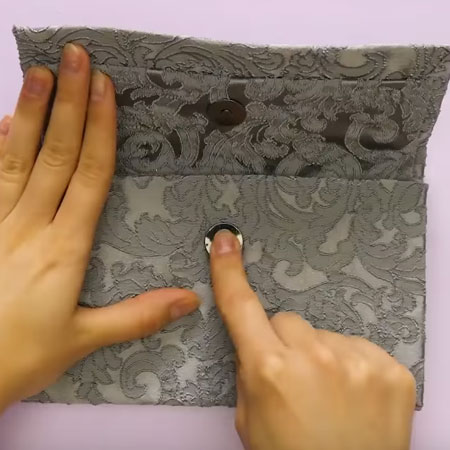 Make a designer clutch from recycled materials