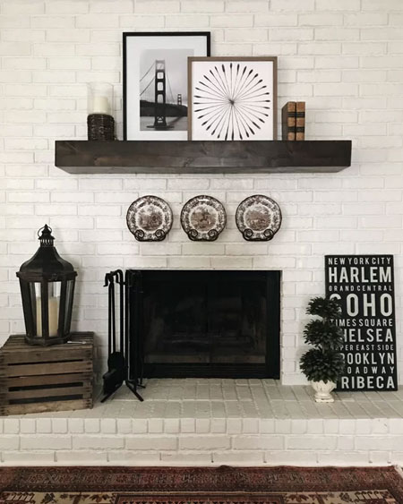 paint brick fireplace surround with white paint