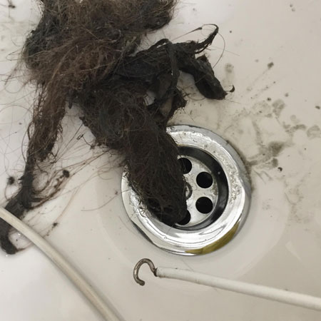 How to remove hair from bathtub and unclog your shower drain 